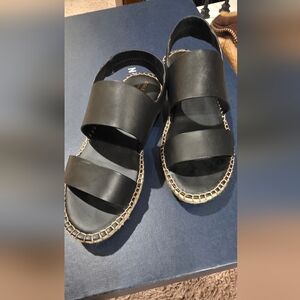 Cole Haan sling back platform sandals.